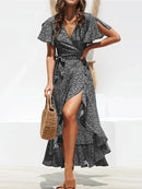 Vestido Boho Longo com Mangas Flare e Estampa Floral – Elegância e Charme para o Verão!
