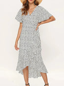 Vestido Boho Longo com Mangas Flare e Estampa Floral – Elegância e Charme para o Verão!